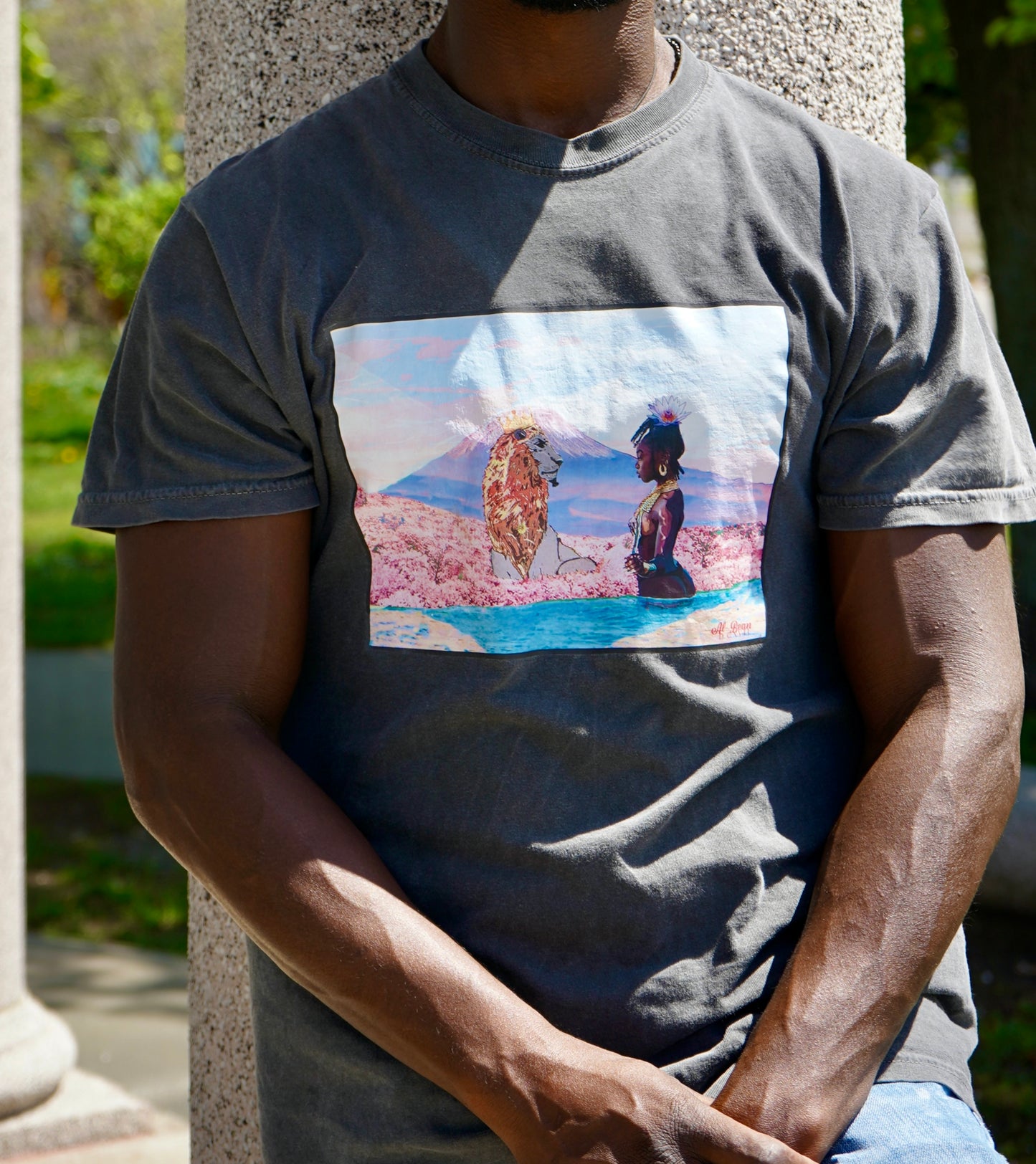 Lion by the sea graphic tee